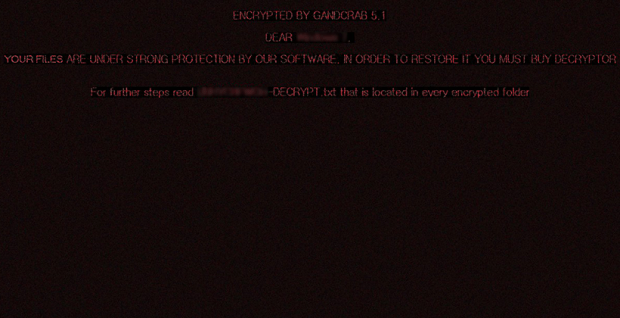 Desktop wallpaper set by GandCrab 5.1.0 with the warning message plus reference to ransom note